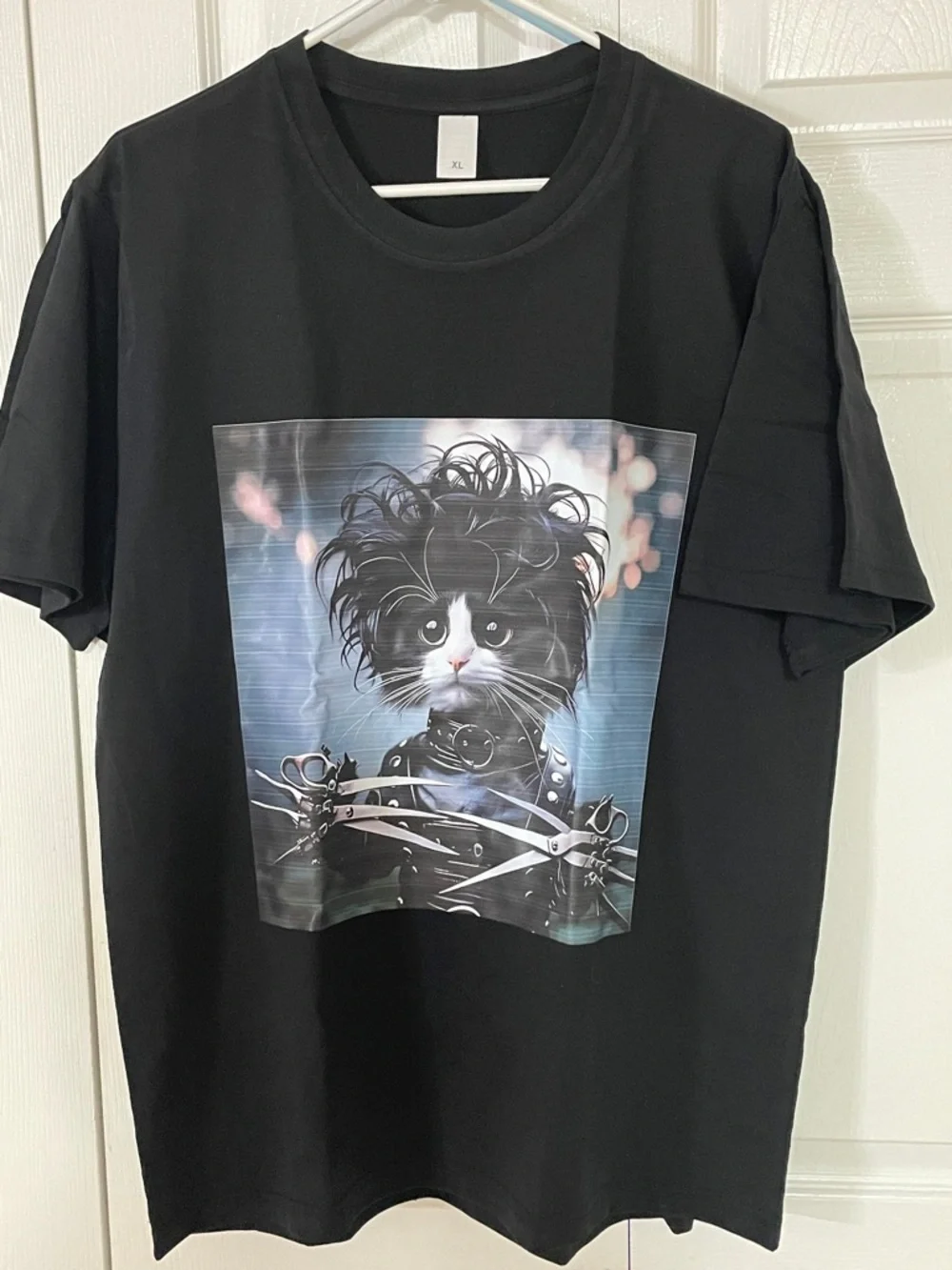 Black Cat Graphic T-Shirt Featuring Stylized Kitty